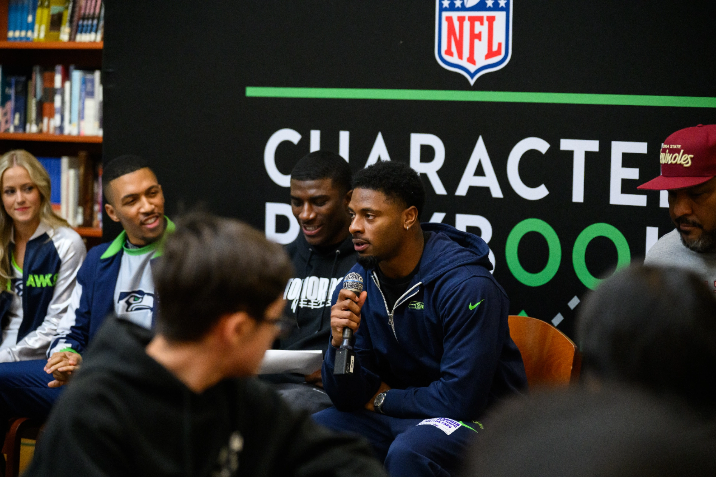 Seahawks players speak to students in library